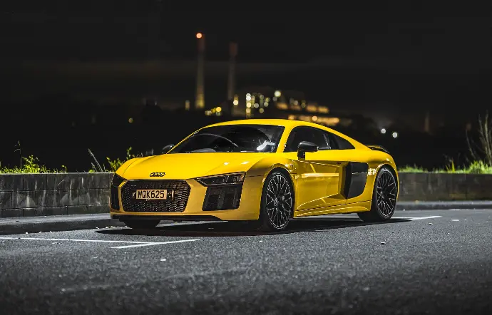 yellow lamborghini aventador on road during night time